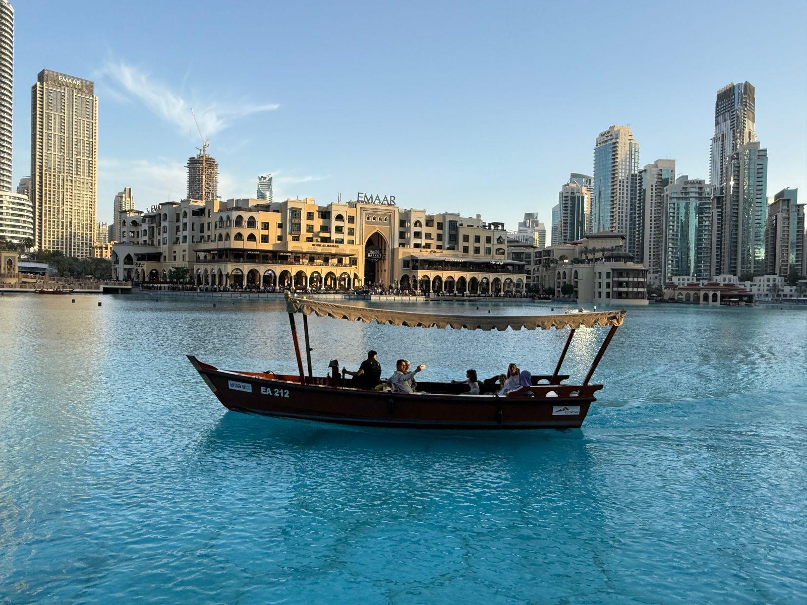 Abra on the lake in front of Dubai Mall